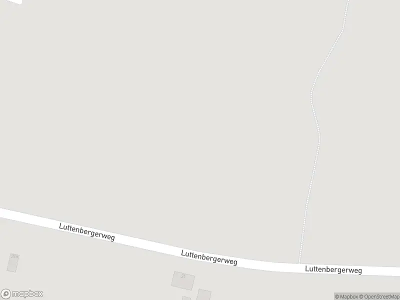 Ambulance en brandweer met grote spoed naar de Luttenbergerweg in Haarle