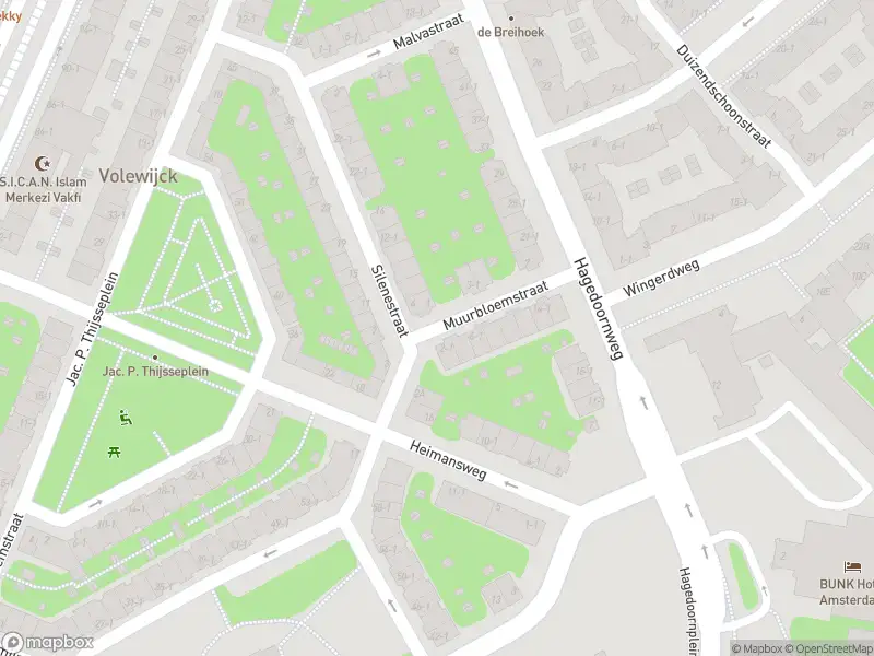 Ambulance met grote spoed naar de Muurbloemstraat in Amsterdam