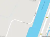 Ambulance met gepaste spoed naar de Boekelerdijk in Alkmaar