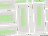 Brandweer met gepaste spoed naar de Courbetstraat in Amsterdam vanwege afhijsen patient