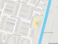 Ambulance met gepaste spoed naar de Walraven van Hallweg in Amsterdam