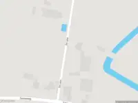 Ambulance met grote spoed naar de De Lane in Strijen