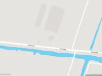 Ambulance met grote spoed naar de Geerweg in Bleskensgraaf