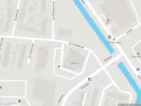 Ambulance met grote spoed naar de De la Reijstraat in Ridderkerk