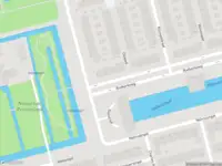 Ambulance met gepaste spoed naar de Beelstraat in Rotterdam