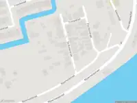Ambulance met grote spoed naar de De Ruyterstraat in Capelle aan den IJssel