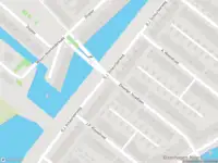 Ambulance met grote spoed naar de Diopter in Amsterdam