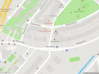 Ambulance met grote spoed naar de Valkenweg in Amsterdam