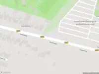 Brandweer met gepaste spoed naar de Grebbeweg in Rhenen vanwege stormschade