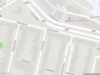 Ambulance met grote spoed naar de Dempostraat in Rotterdam
