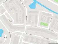 Ambulance met gepaste spoed naar de Van der Waalsstraat in Ridderkerk