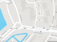 Ambulance met gepaste spoed naar de Olympiaweg in Rotterdam