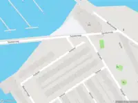 Ambulance met grote spoed naar de Justpier in Zaandam