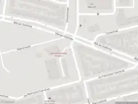 Ambulance met grote spoed naar de Evertsenstraat in IJmuiden