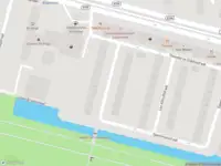 Ambulance met grote spoed naar de Sape Kuiperplantsoen in Amsterdam