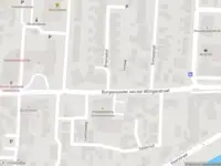 Ambulance met grote spoed naar de Burgemeester van der Willigenstraat in Lekkerkerk
