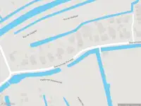 Ambulance met grote spoed naar de Overschiese Kleiweg in Rotterdam
