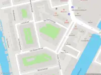 Ambulance met gepaste spoed naar de Schaepmanstraat in Amsterdam