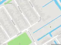 Ambulance met gepaste spoed naar de Rhijnsburgstraat in Rotterdam