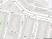 Ambulance met gepaste spoed naar de Dempostraat in Rotterdam