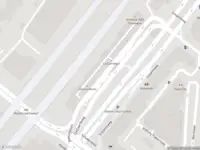 Ambulance met gepaste spoed naar de Dellaertweg in Leiden
