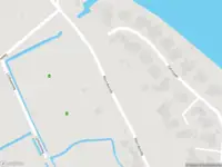 Ambulance met grote spoed naar de Maasdijk in Zwartewaal