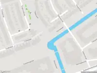 Ambulance met gepaste spoed naar de Ravensteinstraat in Amsterdam