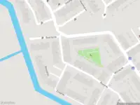 Ambulance met grote spoed naar de Raaigras in Spijkenisse