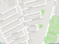 Brandweer met gepaste spoed naar de Boogschutterstraat in Rotterdam