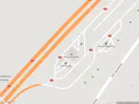 Ambulance met gepaste spoed naar de Autosnelweg A2 in Echt