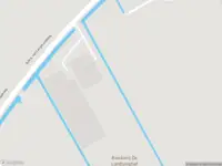 Ambulance met grote spoed naar de A.M.A. van Langeraadweg in Giessenburg