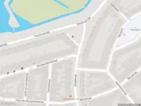 Ambulance met gepaste spoed naar de Nicolaas Beetsstraat in Schiedam