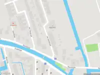 Ambulance met grote spoed naar de Van Gentstraat in Goudriaan