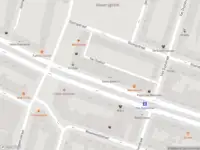 Ambulance met grote spoed naar de Schiedamseweg in Rotterdam
