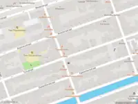 Ambulance met gepaste spoed naar de Tuinstraat in Amsterdam