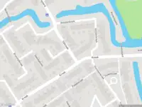 Ambulance met gepaste spoed naar de Ebkreek in Spijkenisse