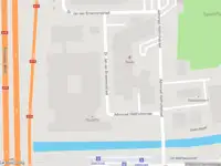 Ambulance met gepaste spoed naar de Dr. Jan van Breemenstraat in Amsterdam