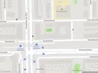 Ambulance met grote spoed naar de Beringenstraat in Amsterdam