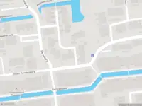 Ambulance met grote spoed naar de Elegastburg in Capelle aan den IJssel