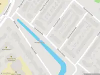 Ambulance met gepaste spoed naar de Uhlenbeckkade in Leiden