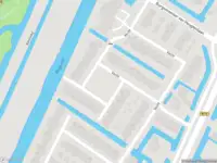 Ambulance met grote spoed naar de Merwede in Nieuwerkerk aan den IJssel