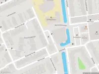 Ambulance met grote spoed naar de Warmoezenierstraat in Schiedam
