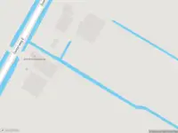 Brandweer met grote spoed naar de Oosterweg E in Purmer