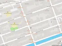 Ambulance met grote spoed naar de Tweede Egelantiersdwarsstraat in Amsterdam