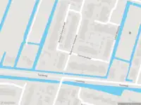 Ambulance met grote spoed naar de Rederij van Holststraat in Krimpen aan de Lek