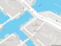 Brandweer met gepaste spoed naar de 's-Gravenhekje in Amsterdam vanwege stormschade