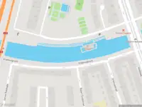 Ambulance met gepaste spoed naar de Bos en Lommerplantsoen in Amsterdam