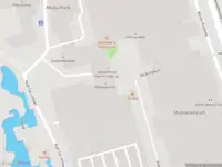 Brandweer met grote spoed naar de Joop van den Endeplein in Hilversum vanwege activering sprinkler