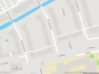 Ambulance met grote spoed naar de Peursumstraat in Amsterdam