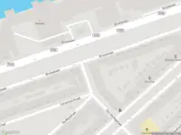 Ambulance met gepaste spoed naar de Den Hertigstraat in Rotterdam